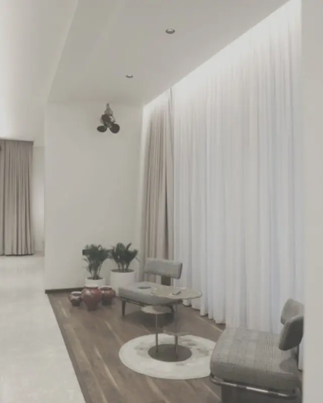 Corridor with a dropped ceiling and a lit cove along the window wall, timber floor inset